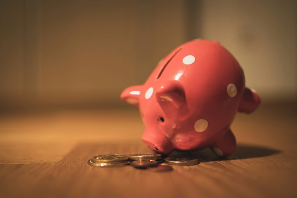 tipped_piggy_bank_stock