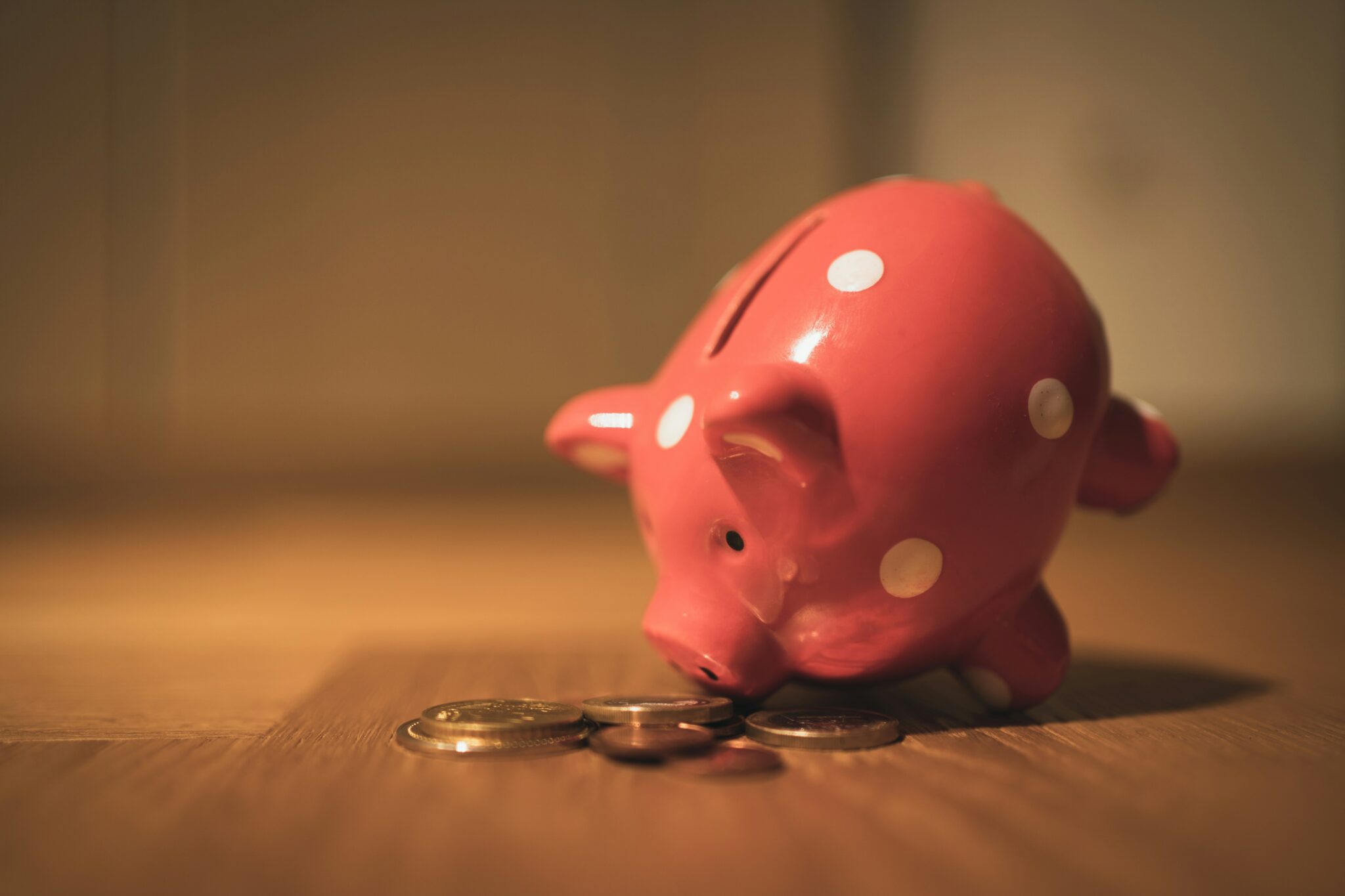 tipped_piggy_bank_stock